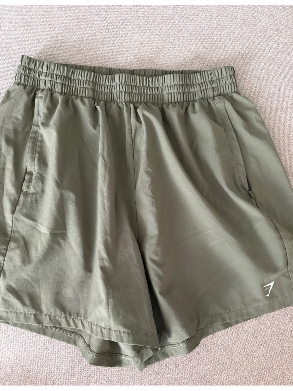 Gymshark olive Women’s Lightweight pocket shorts